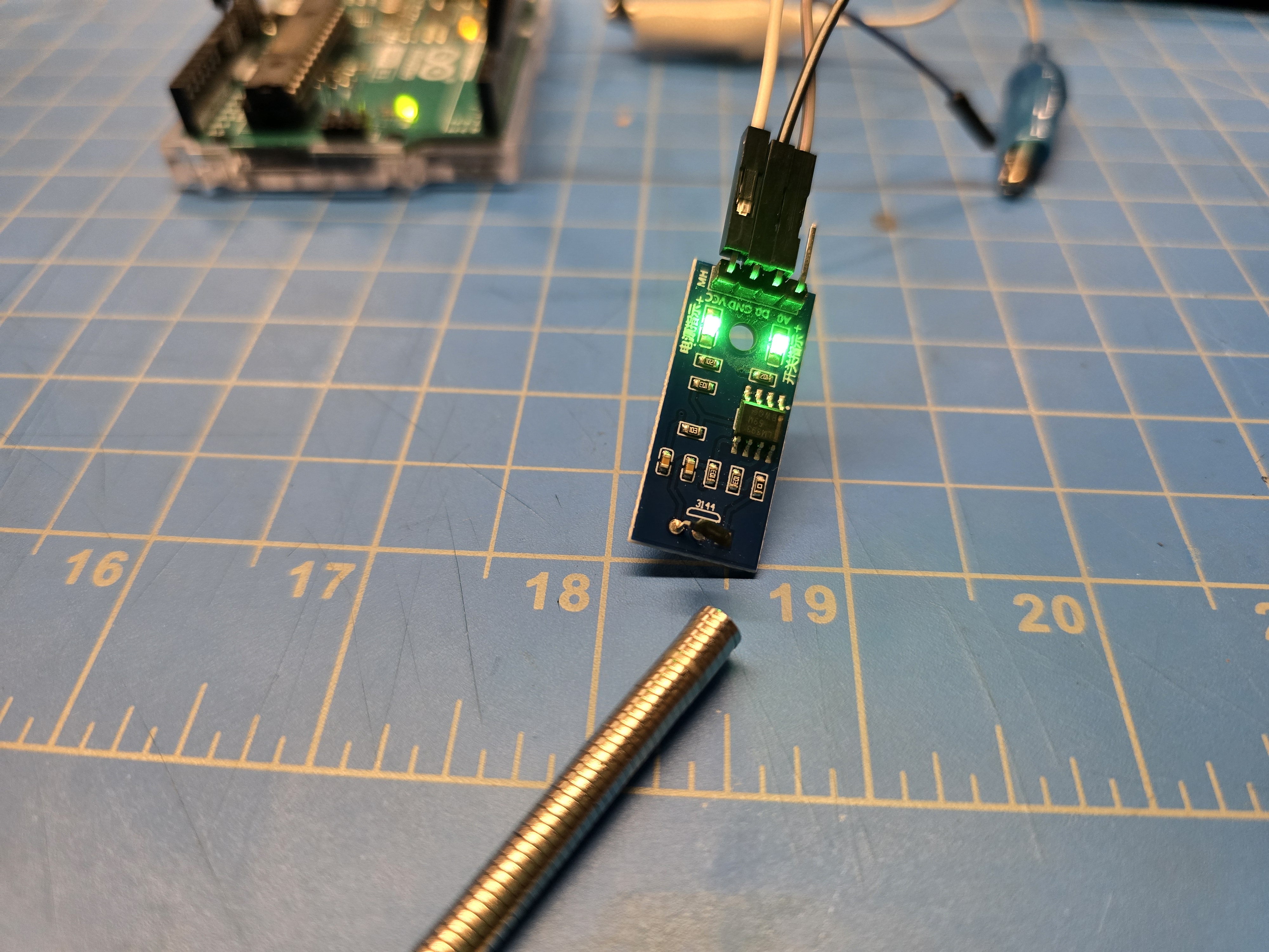 Tuning magnet count and placement so the magnet holds to one wall yet still triggers reliably