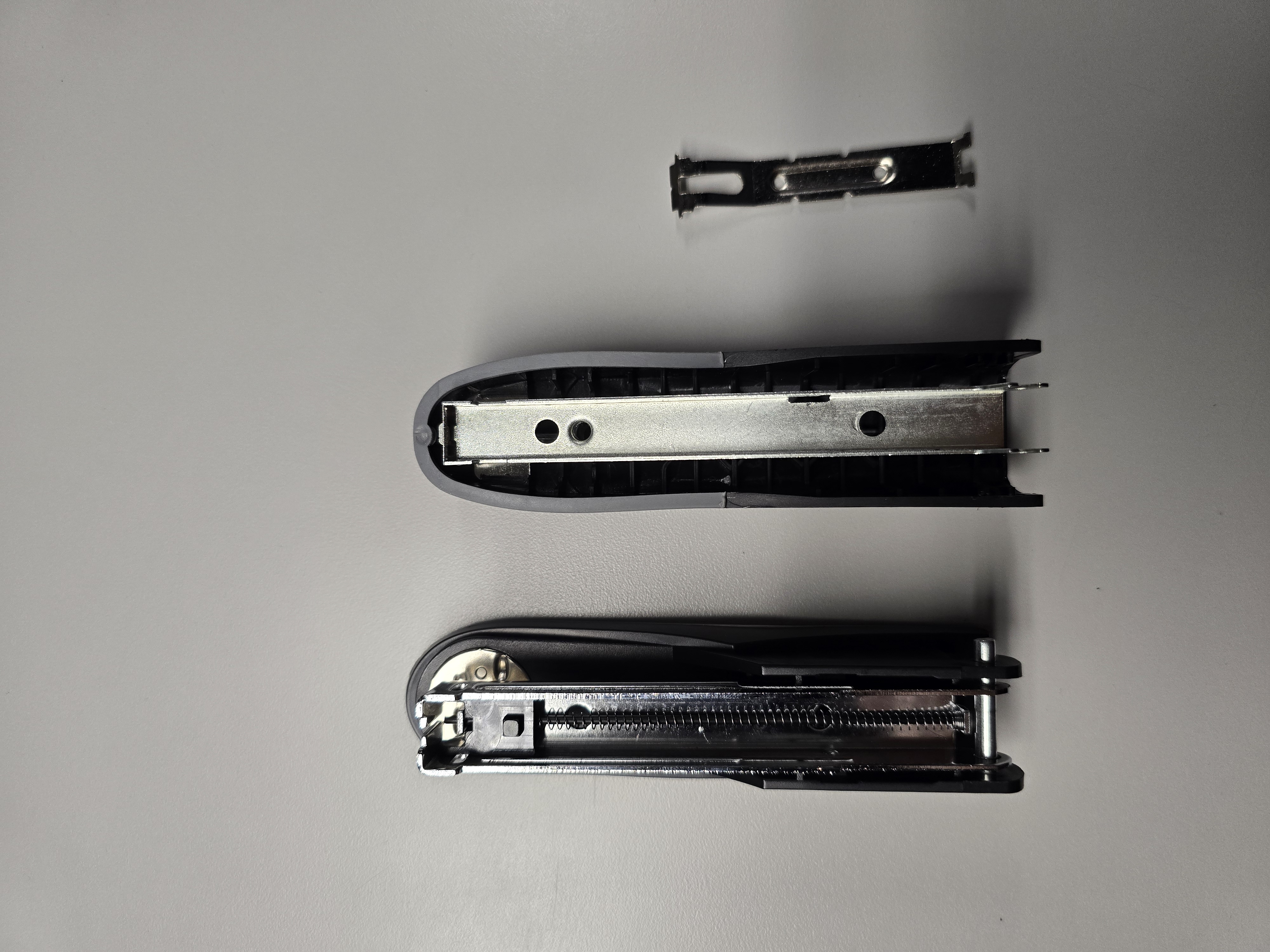 Top-down of stapler components laid out